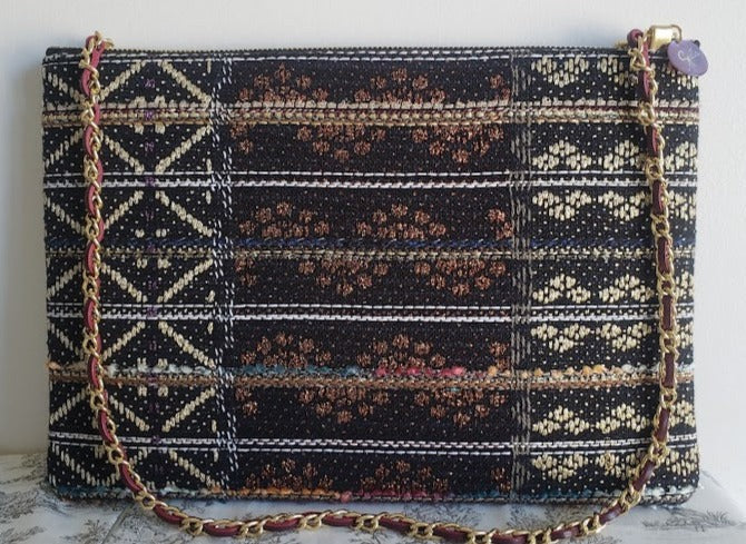 Sac pochette chaîne "Eclat Haute Joaillerie et lumières des villes vues du ciel la nuit."