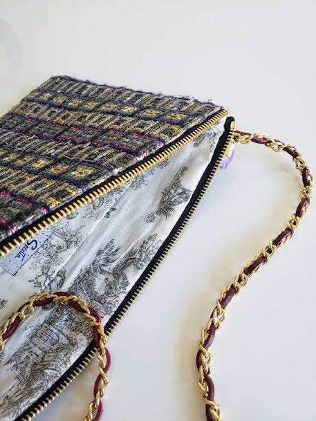 Sac pochette chaîne "Eclat Haute Joaillerie et lumières des villes vues du ciel la nuit."