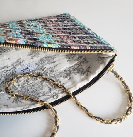 Sac pochette chaîne "Le Plaisir de la similitude sans la répétition de l'automne."