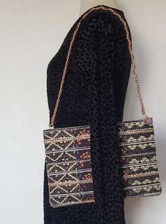 Sac pochette chaîne "Eclat Haute Joaillerie et lumières des villes vues du ciel la nuit."