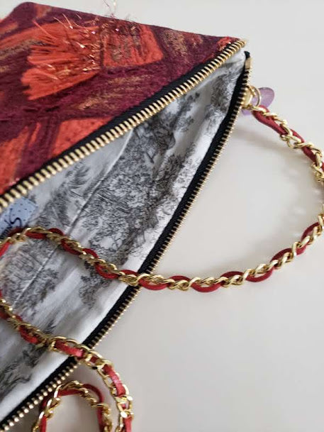 Sac pochette chaîne de fêtes "Reine de la fête et cotillons, serpentins..."