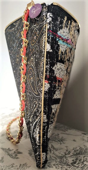 Sac pochette de fêtes " Noël, guirlandes dans les arbres sous la lune argentée."