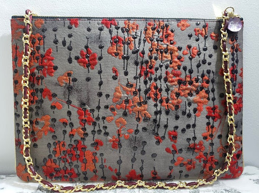 Sac pochette "Feuilles de fougères et petites fleurs rougissantes d'automne."